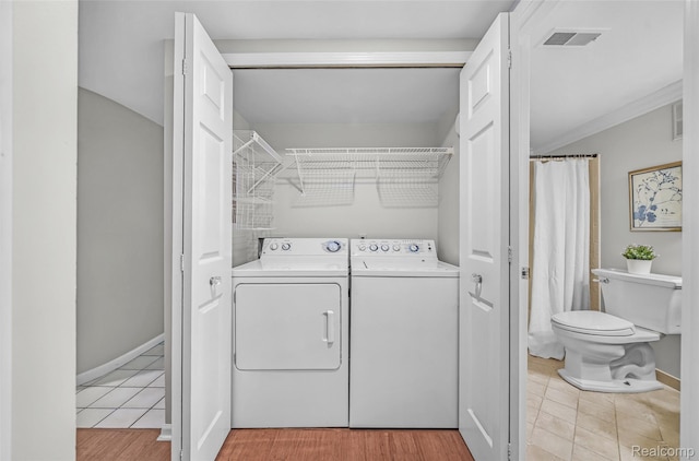 3553 Port Cove Dr Unit 39, Waterford, MI 48328 - washroom with washer and clothes dryer