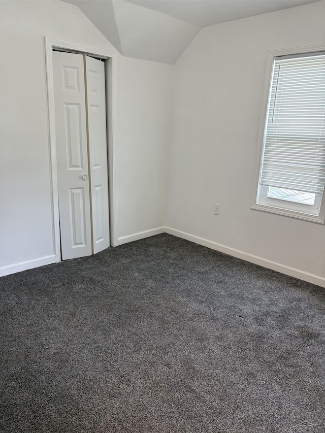 2024 Cooper Ave, Saginaw, MI 48602 - bonus room with lofted ceiling and dark colored carpet