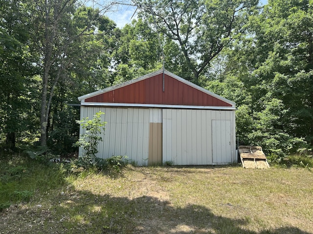 3245 W Leisura Loop, Baldwin, MI 49304 - view of pole building featuring a lawn
