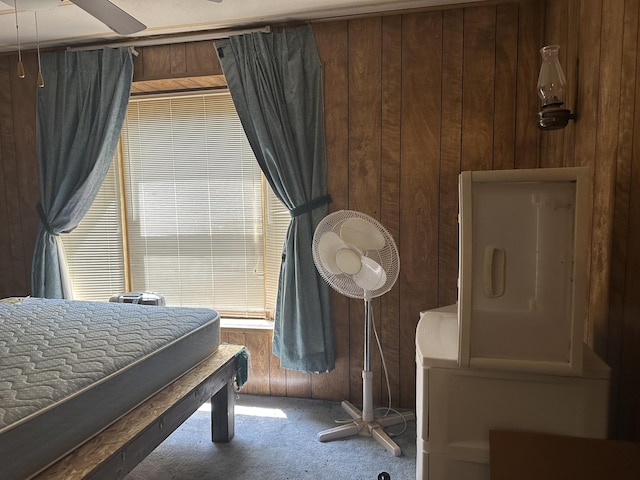 3245 W Leisura Loop, Baldwin, MI 49304 - carpeted bedroom featuring wood walls