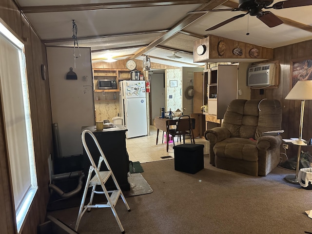 3245 W Leisura Loop, Baldwin, MI 49304 - living area with wood walls, ceiling fan, and an AC wall unit