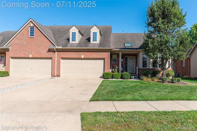 49866 Sleeping River Dr, Macomb, MI 48042 - view of front of property featuring brick siding, a front lawn, concrete driveway, and a shingled roof
