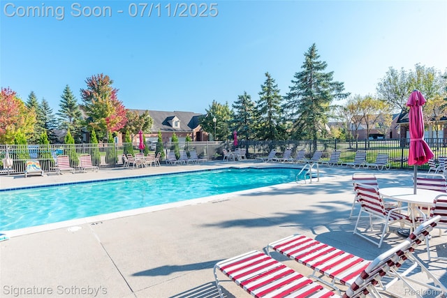 49866 Sleeping River Dr, Macomb, MI 48042 - community pool with a patio area