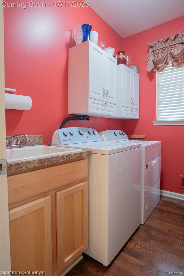 49866 Sleeping River Dr, Macomb, MI 48042 - washroom featuring cabinet space, washer and clothes dryer, and dark wood-style floors