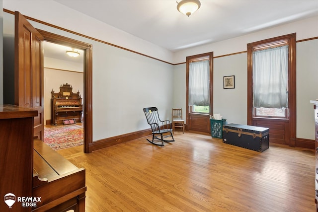 616 S Warren Ave, Saginaw, MI 48607 - sitting room featuring light wood-style floors and baseboards