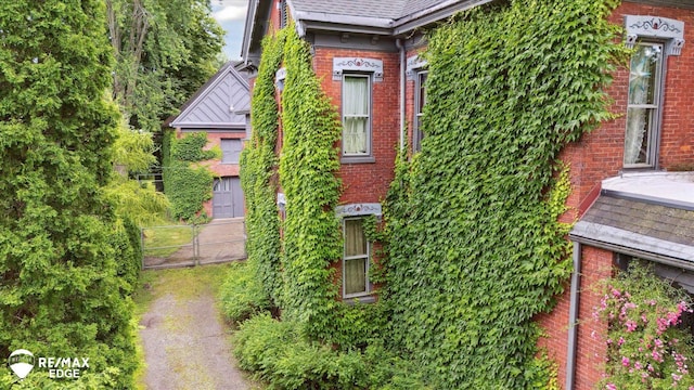616 S Warren Ave, Saginaw, MI 48607 - view of home's exterior with brick siding