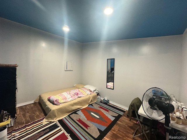 3875 Sobieski St, Hamtramck, MI 48212 - bedroom featuring wood finished floors and baseboards