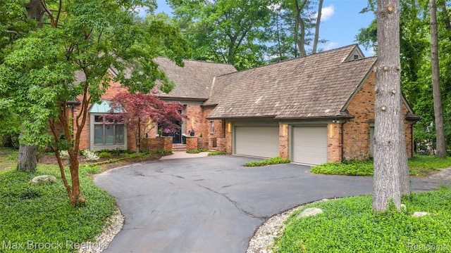 3546 Bloomfield Club Dr, Bloomfield Hills, MI 48301 - english style home with driveway, brick siding, and a garage
