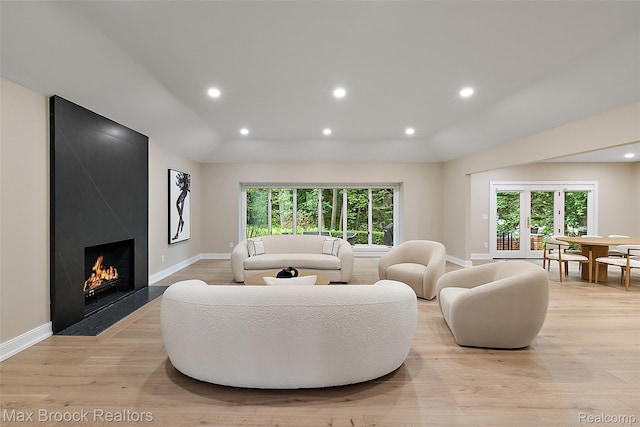 3546 Bloomfield Club Dr, Bloomfield Hills, MI 48301 - living room featuring light wood-style flooring, healthy amount of natural light, a fireplace, recessed lighting, and lofted ceiling