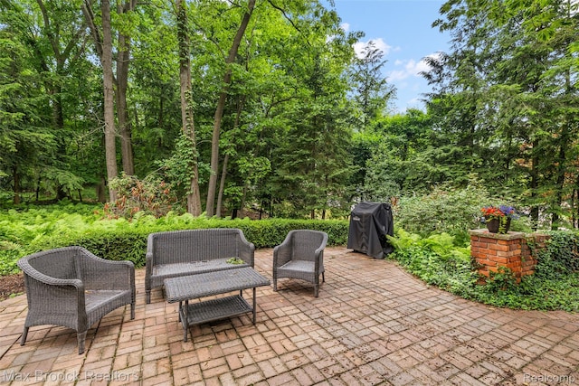 3546 Bloomfield Club Dr, Bloomfield Hills, MI 48301 - view of patio with a grill and a forest view