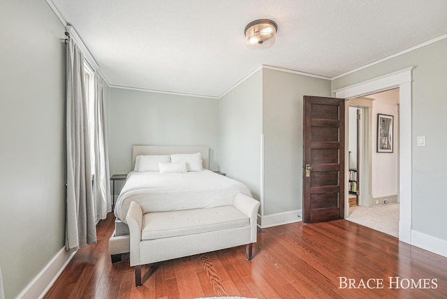 1035 Fountain St NE, Grand Rapids, MI 49503 - bedroom with wood finished floors and ornamental molding