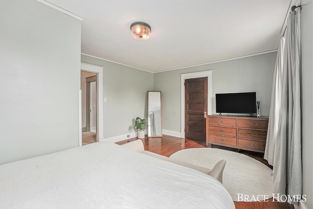 1035 Fountain St NE, Grand Rapids, MI 49503 - bedroom with crown molding and wood finished floors