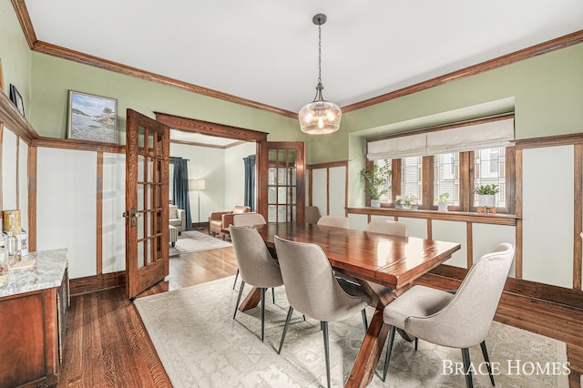 1035 Fountain St NE, Grand Rapids, MI 49503 - dining room with french doors, dark wood-type flooring, and ornamental molding
