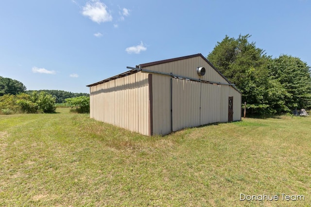 4875 Ferris Ave, Newaygo, MI 49337 - view of pole building featuring a lawn