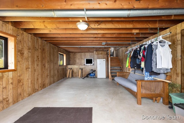 4875 Ferris Ave, Newaygo, MI 49337 - basement with stairs and wood walls