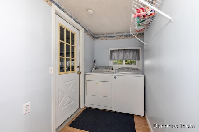 4875 Ferris Ave, Newaygo, MI 49337 - laundry area featuring independent washer and dryer and light wood-style flooring