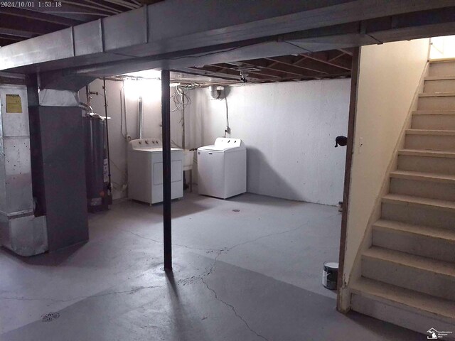 27354 Oakcrest Dr, Brownstown, MI 48183 - unfinished below grade area with independent washer and dryer, stairs, gas water heater, and heating unit