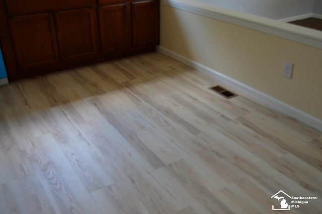 27354 Oakcrest Dr, Brownstown, MI 48183 - detailed view of wood finished floors and baseboards