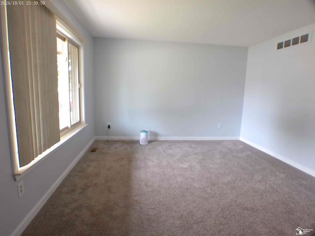27354 Oakcrest Dr, Brownstown, MI 48183 - carpeted empty room featuring baseboards