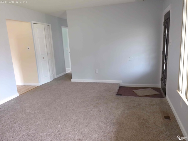 27354 Oakcrest Dr, Brownstown, MI 48183 - carpeted empty room featuring baseboards