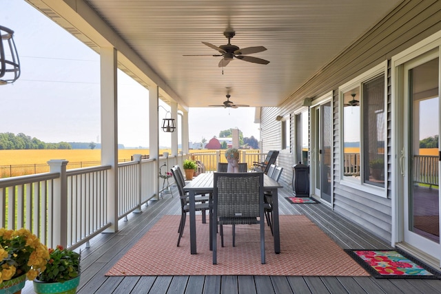 12529 E Tuscola Rd, Frankenmuth, MI 48734 - deck with outdoor dining area and ceiling fan