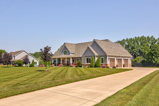 12529 E Tuscola Rd, Frankenmuth, MI 48734 - craftsman house featuring concrete driveway and an attached garage