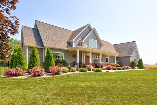 12529 E Tuscola Rd, Frankenmuth, MI 48734 - view of front of property featuring covered porch and roof with shingles