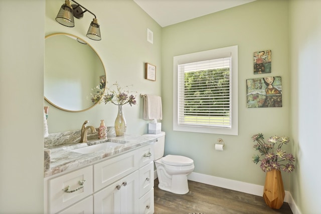 12529 E Tuscola Rd, Frankenmuth, MI 48734 - bathroom featuring vanity and wood finished floors