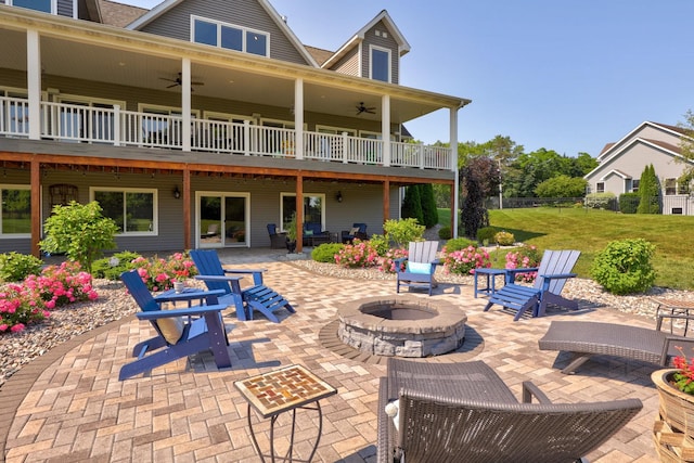 12529 E Tuscola Rd, Frankenmuth, MI 48734 - view of patio with ceiling fan and a fire pit