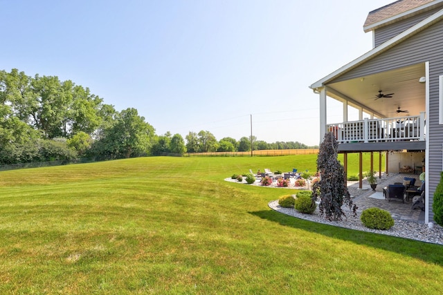 12529 E Tuscola Rd, Frankenmuth, MI 48734 - view of green lawn featuring a ceiling fan and a patio