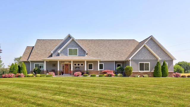 12529 E Tuscola Rd, Frankenmuth, MI 48734 - view of front of property featuring a front lawn, a porch, and a shingled roof