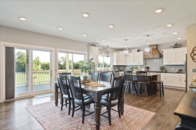 12529 E Tuscola Rd, Frankenmuth, MI 48734 - dining area with dark wood-type flooring, a textured ceiling, and recessed lighting
