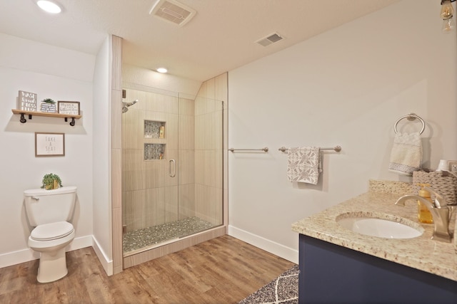 12529 E Tuscola Rd, Frankenmuth, MI 48734 - full bathroom featuring a shower stall, wood finished floors, vanity, and recessed lighting