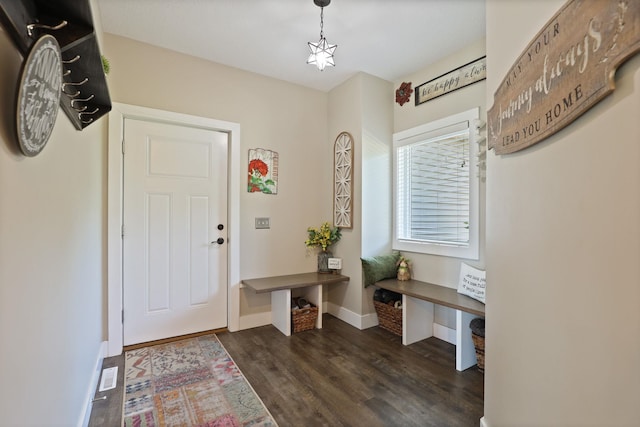 12529 E Tuscola Rd, Frankenmuth, MI 48734 - entryway featuring dark wood-type flooring and baseboards