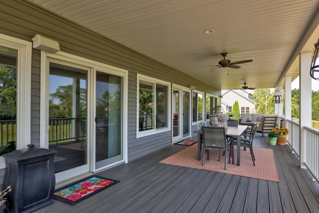 12529 E Tuscola Rd, Frankenmuth, MI 48734 - wooden terrace featuring outdoor dining space and ceiling fan