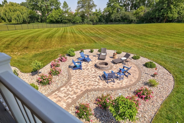 12529 E Tuscola Rd, Frankenmuth, MI 48734 - view of yard featuring a patio area, view of wooded area, and a fire pit