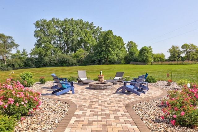 12529 E Tuscola Rd, Frankenmuth, MI 48734 - view of patio with a fire pit and view of scattered trees