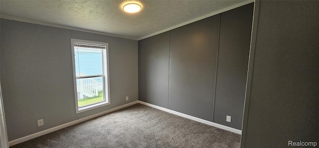 7102 Highlander Cir, Alma, MI 48801 - unfurnished room featuring carpet and a textured ceiling