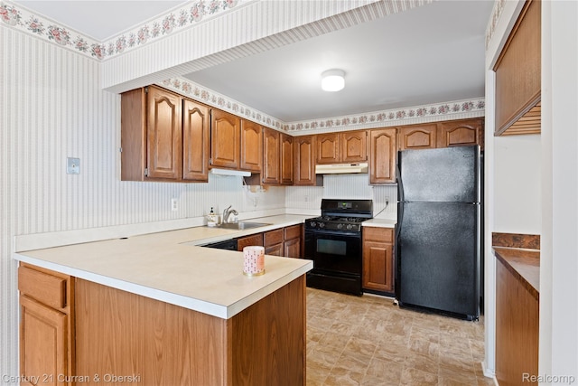 20918 W Glen Haven Cir, Novi, MI 48167 - kitchen featuring black appliances, under cabinet range hood, a peninsula, brown cabinetry, and light countertops