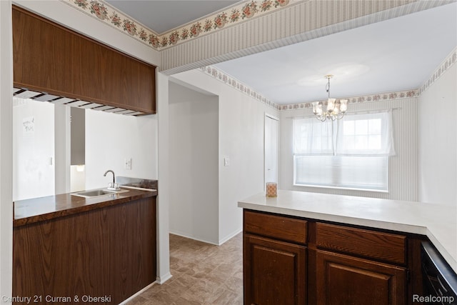 20918 W Glen Haven Cir, Novi, MI 48167 - kitchen featuring a chandelier and pendant lighting