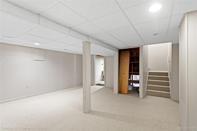 20918 W Glen Haven Cir, Novi, MI 48167 - finished basement with carpet floors, stairway, a paneled ceiling, and recessed lighting