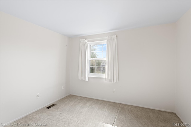 20918 W Glen Haven Cir, Novi, MI 48167 - empty room featuring light carpet and baseboards