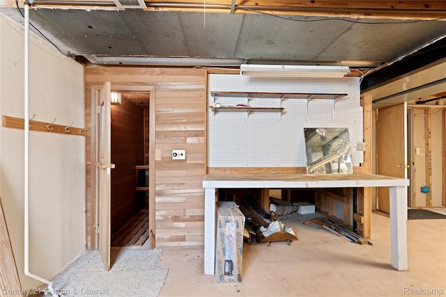 20918 W Glen Haven Cir, Novi, MI 48167 - unfinished basement featuring a workshop area and wood walls