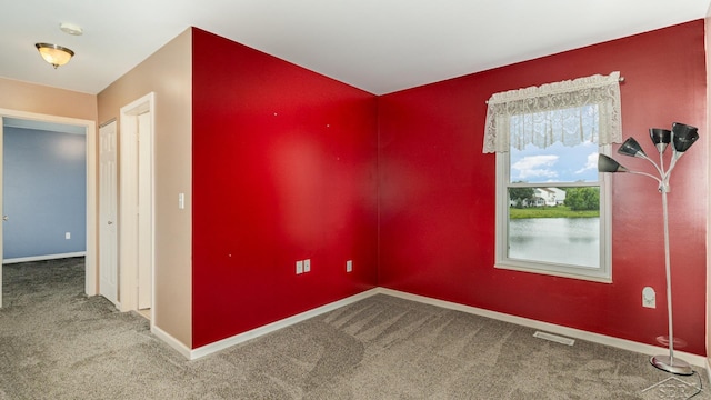 3244 Pine Run Dr, Swartz Creek, MI 48473 - empty room with carpet and a smoke detector