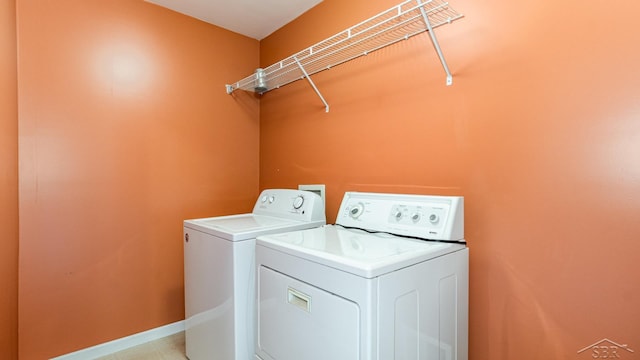 3244 Pine Run Dr, Swartz Creek, MI 48473 - laundry area with independent washer and dryer and baseboards