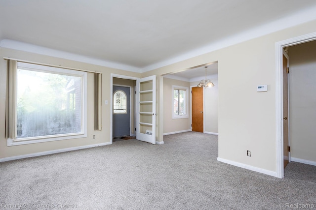 20510 Rosemont Ave, Detroit, MI 48219 - carpeted empty room featuring a chandelier and baseboards