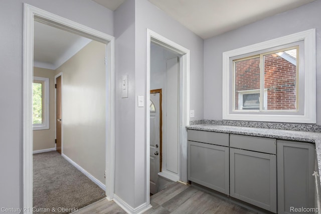 20510 Rosemont Ave, Detroit, MI 48219 - hallway featuring light wood finished floors and baseboards