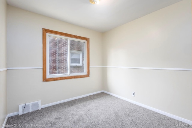 20510 Rosemont Ave, Detroit, MI 48219 - carpeted empty room featuring baseboards