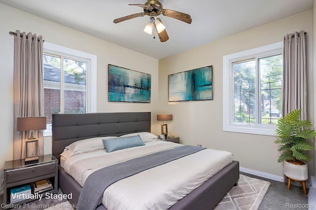 20510 Rosemont Ave, Detroit, MI 48219 - bedroom featuring multiple windows, ceiling fan, and carpet floors