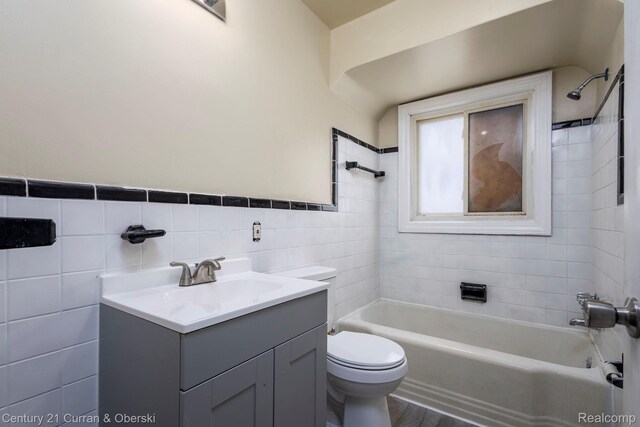20510 Rosemont Ave, Detroit, MI 48219 - full bath featuring vanity,  shower combination, tile walls, and wood finished floors